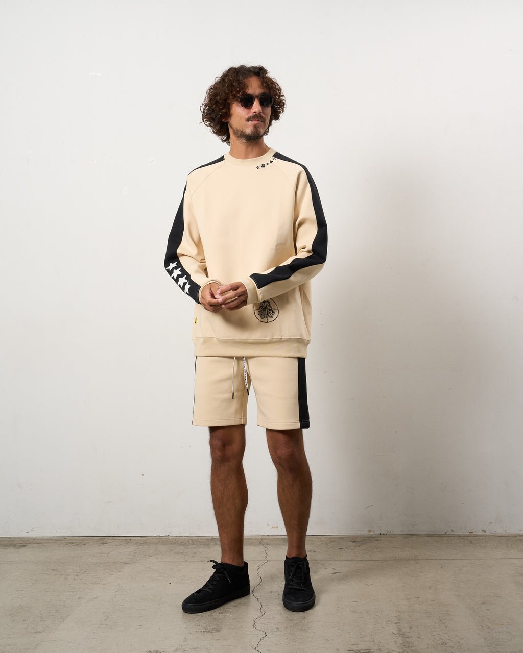 TRストレッチポンチ ラインストーン ターゲットベア ラインスエットシャツ