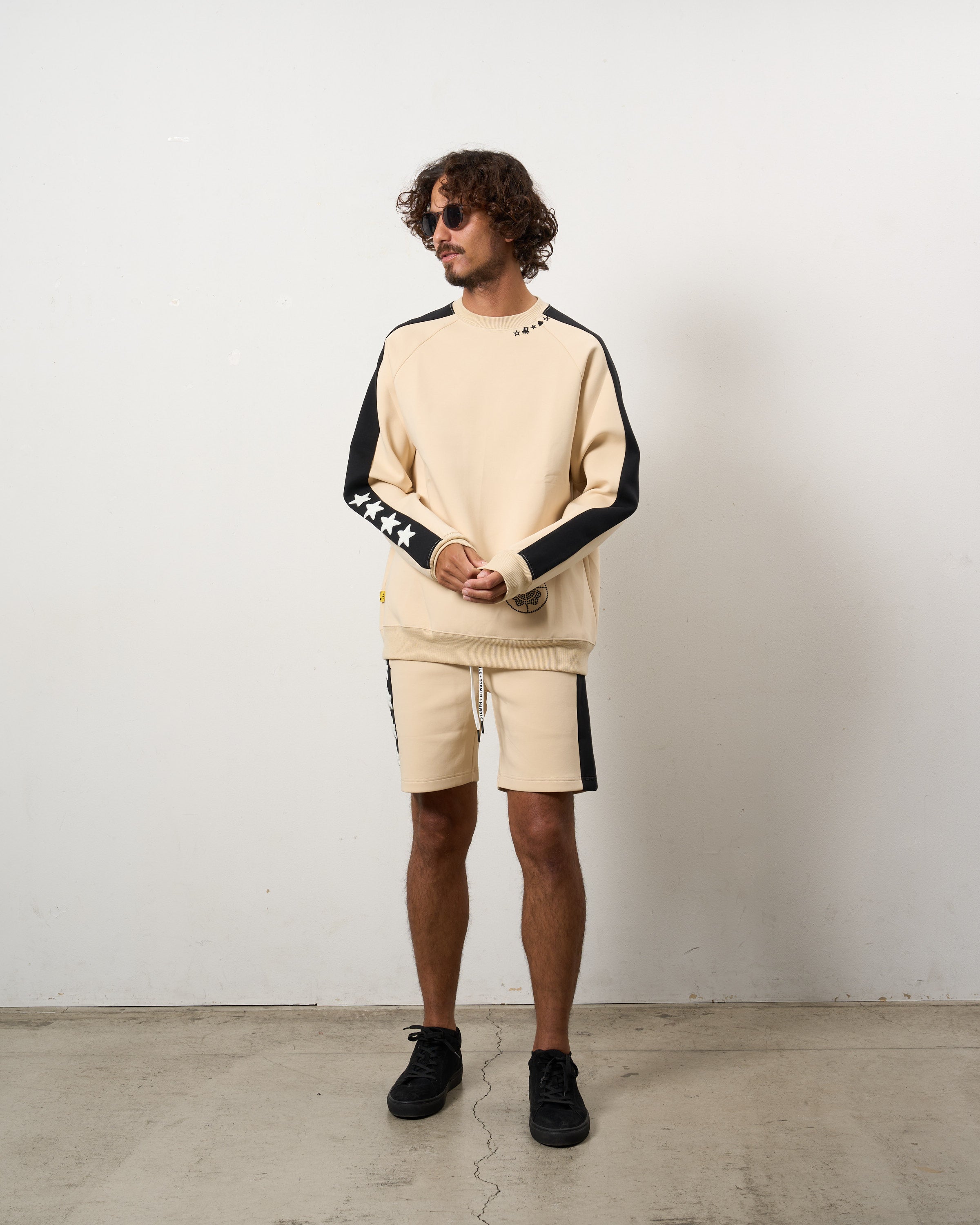 TRストレッチポンチ ラインストーン ターゲットベア ラインスエットシャツ