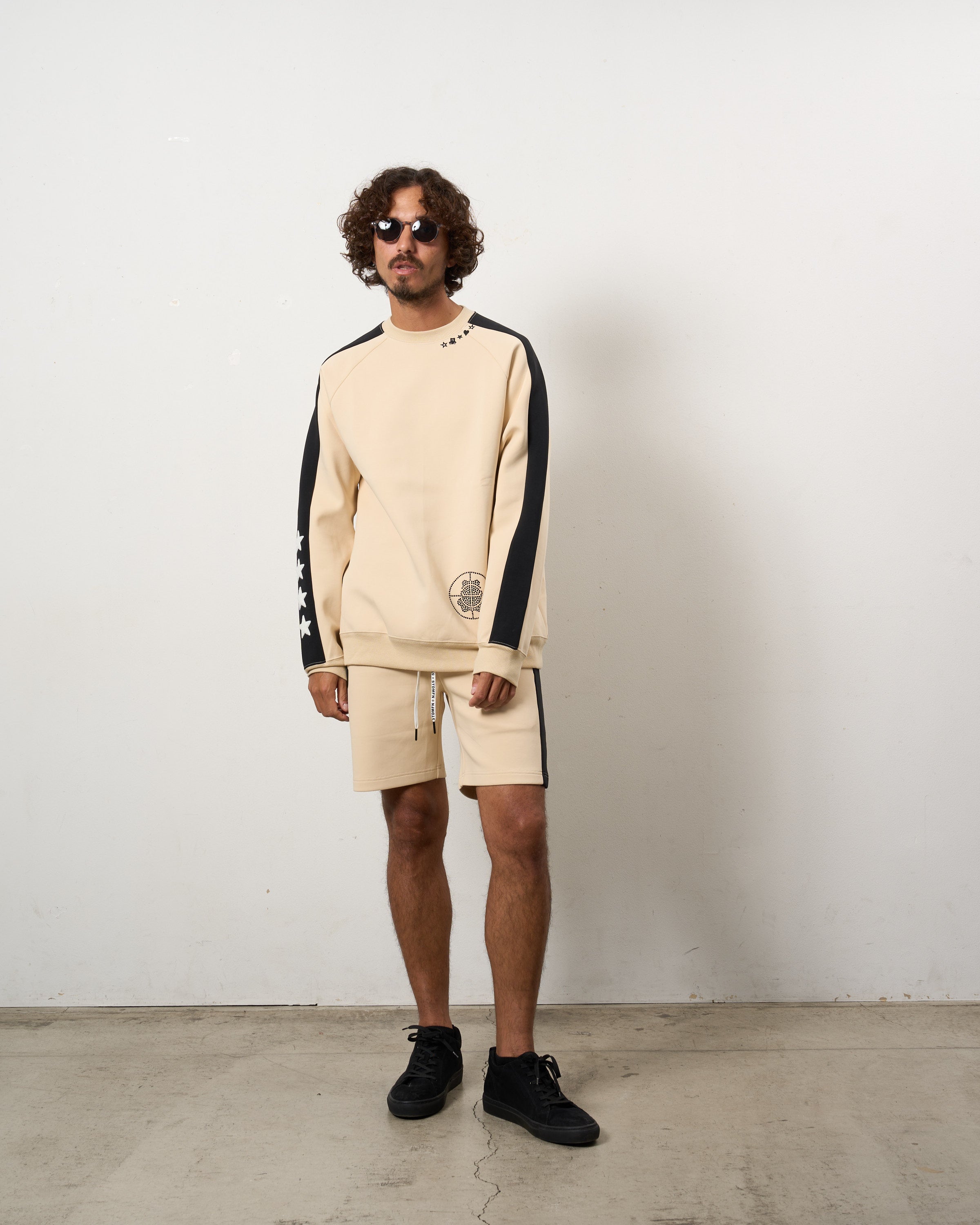 TRストレッチポンチ ラインストーン ターゲットベア ラインスエットシャツ