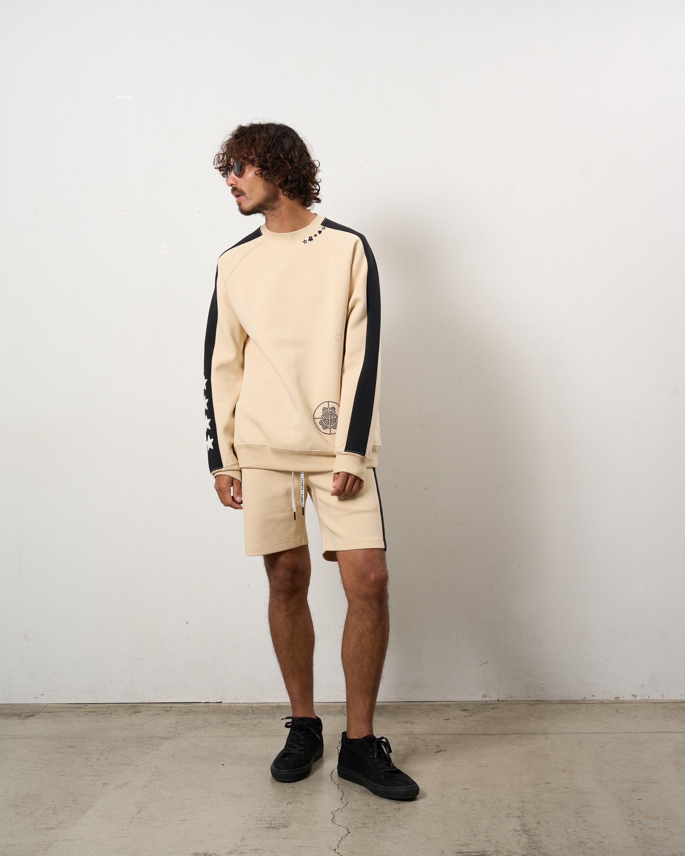 TRストレッチポンチ ラインストーン ターゲットベア ラインスエットシャツ