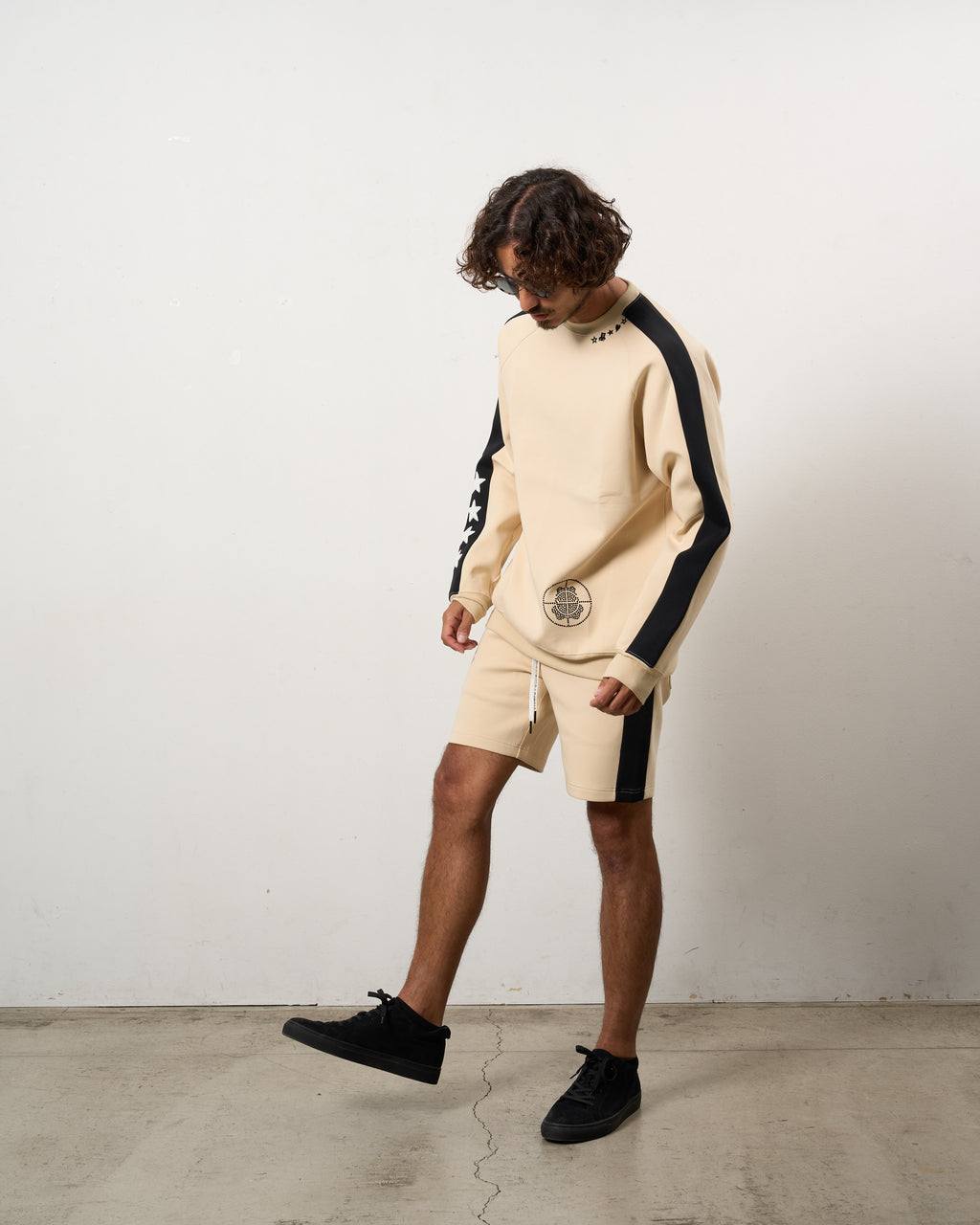 TRストレッチポンチ ラインストーン ターゲットベア ラインスエットシャツ