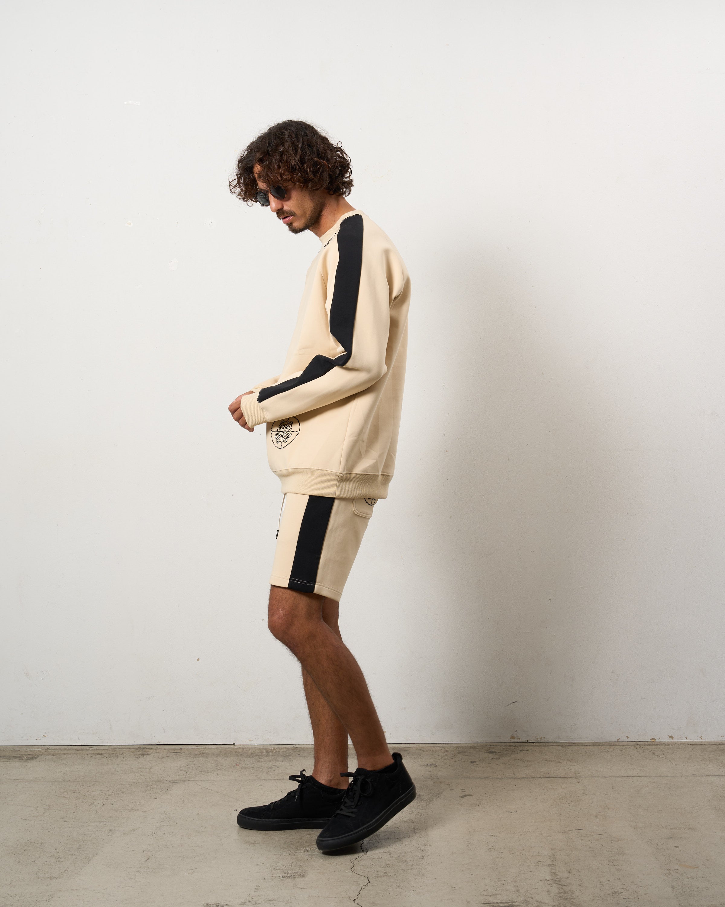 TRストレッチポンチ ラインストーン ターゲットベア ラインスエットシャツ