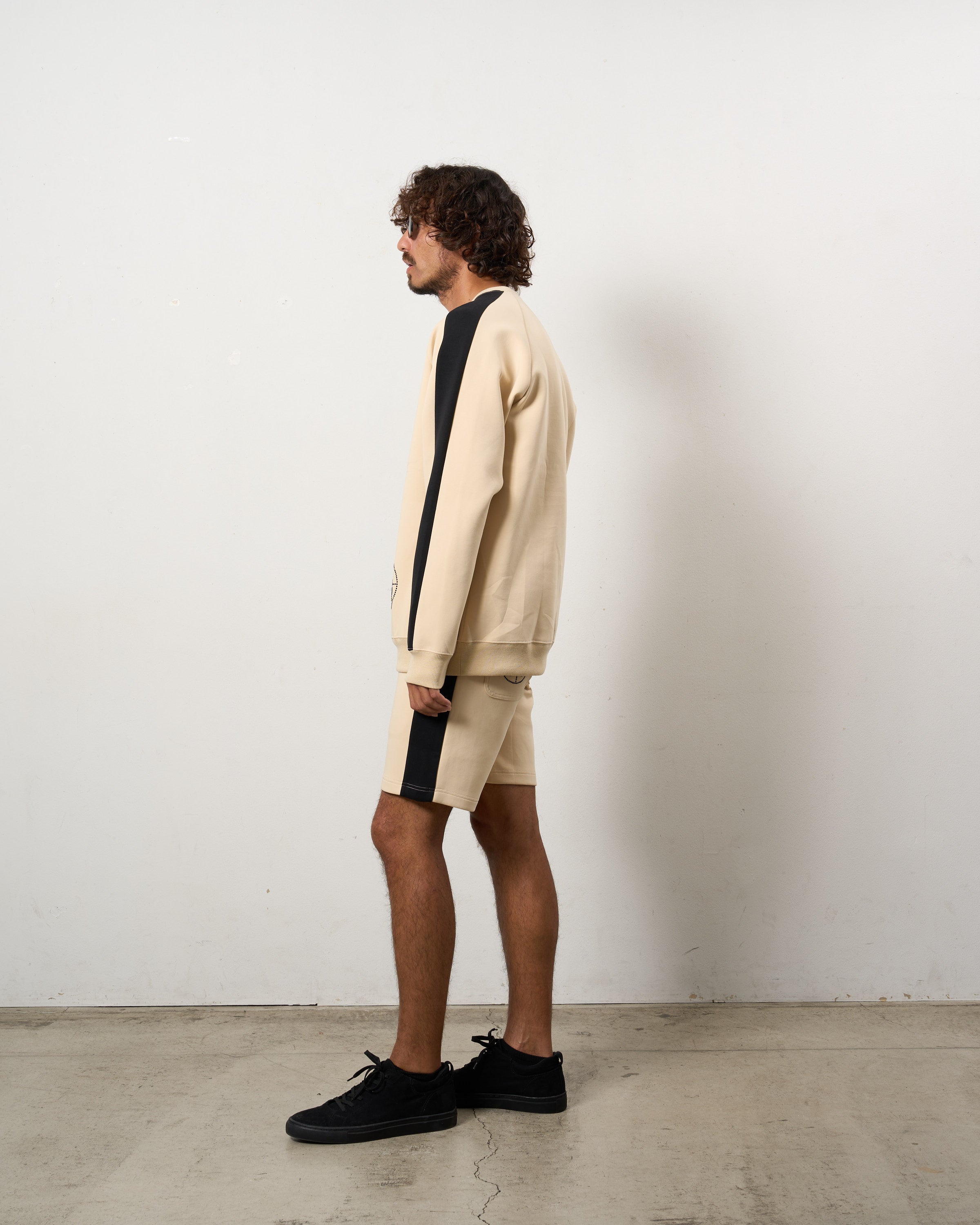 TRストレッチポンチ ラインストーン ターゲットベア ラインスエットシャツ