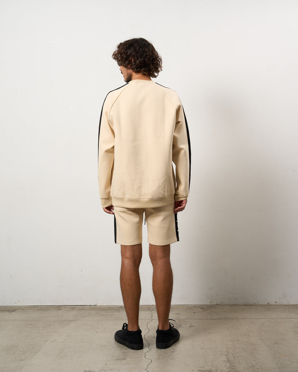 TRストレッチポンチ ラインストーン ターゲットベア ラインスエットシャツ