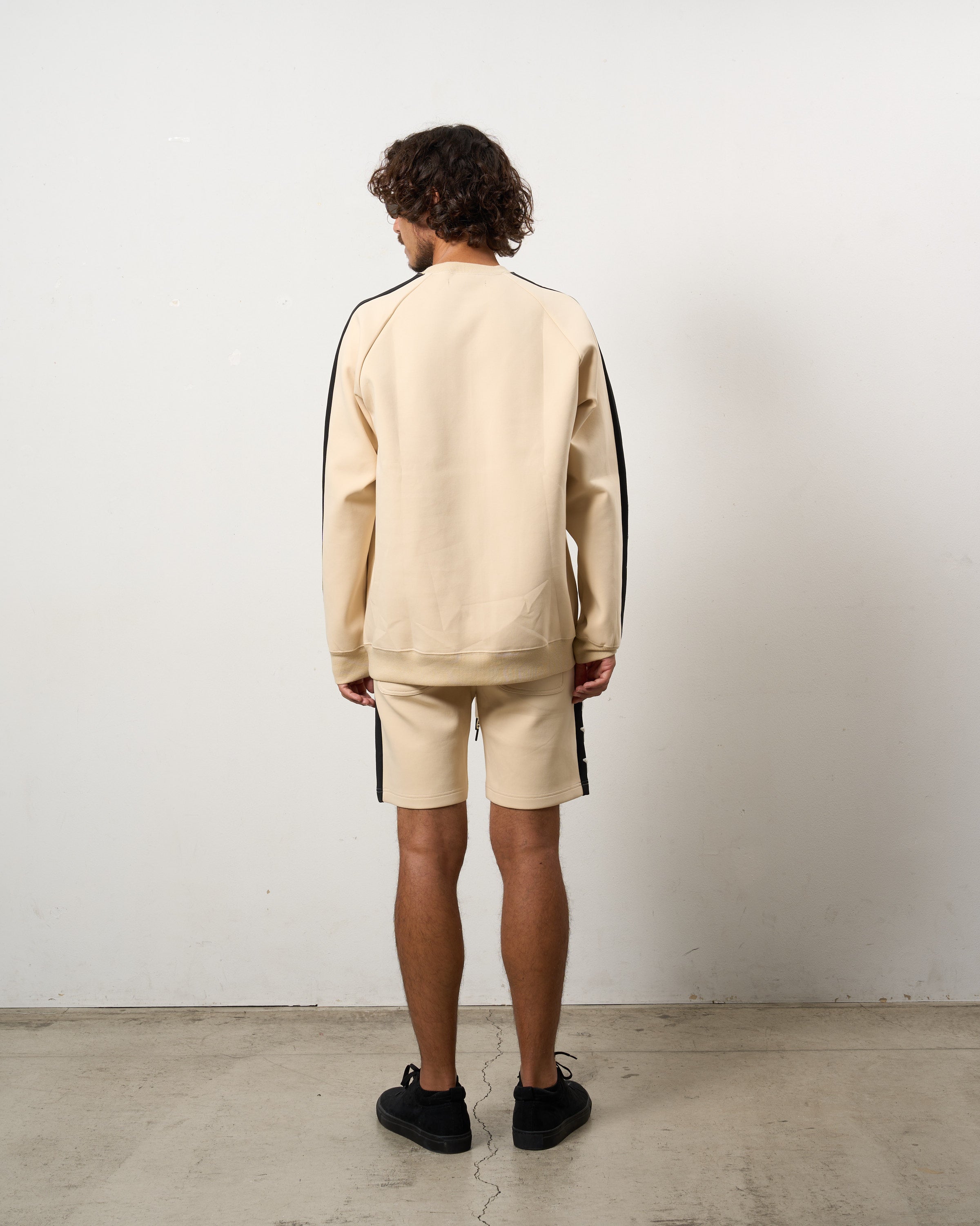 TRストレッチポンチ ラインストーン ターゲットベア ラインスエットシャツ