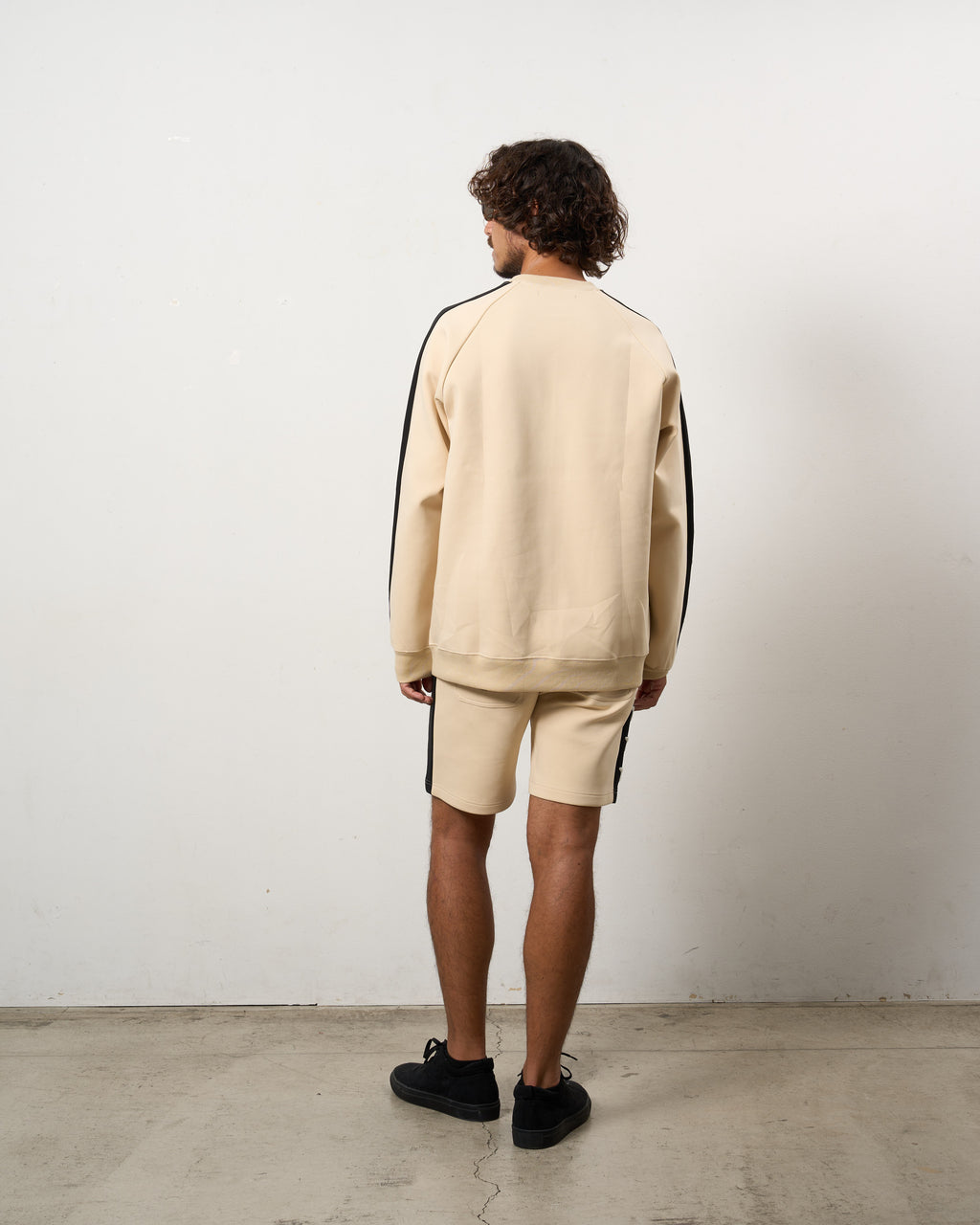 TRストレッチポンチ ラインストーン ターゲットベア ラインスエットシャツ