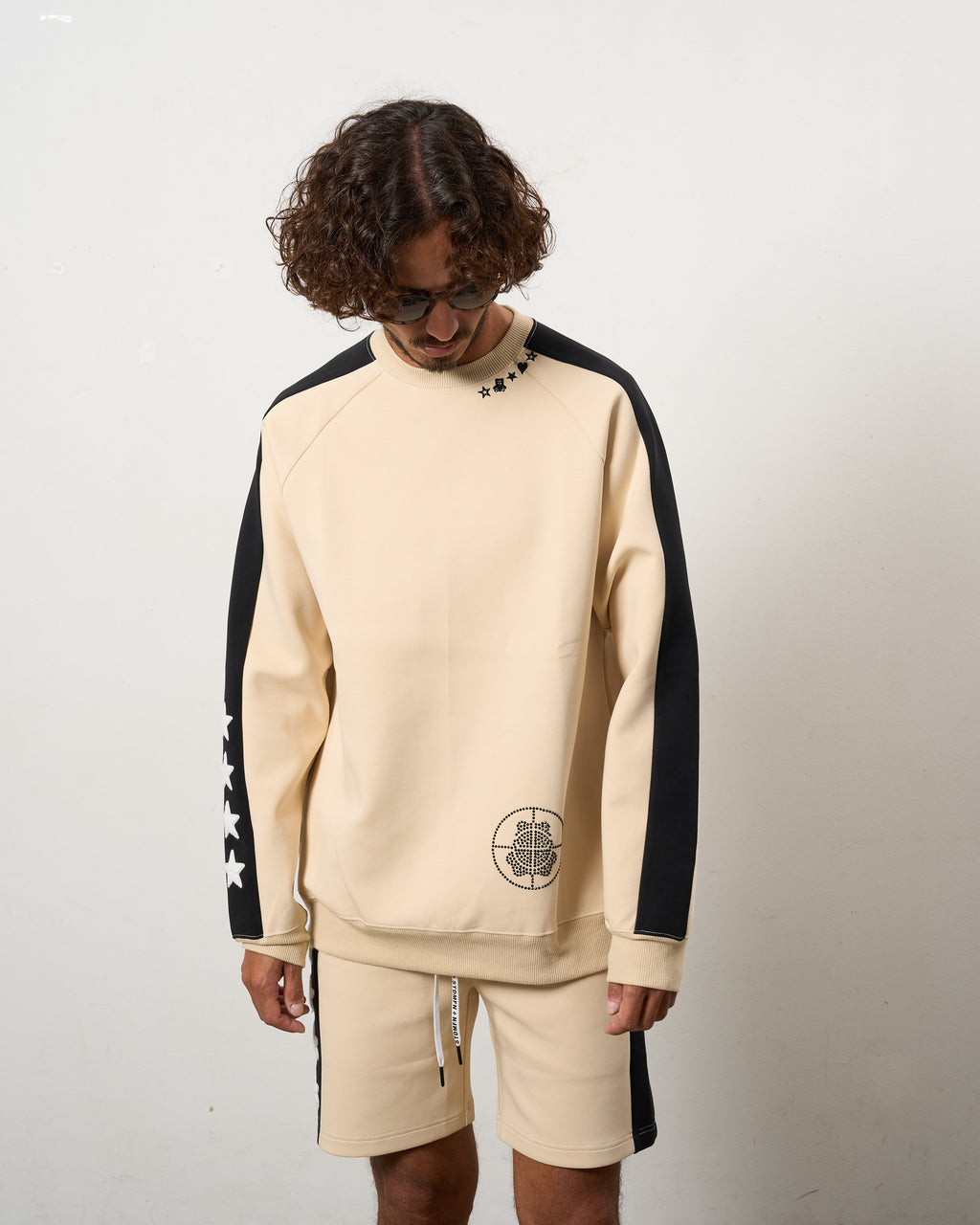 TRストレッチポンチ ラインストーン ターゲットベア ラインスエットシャツ