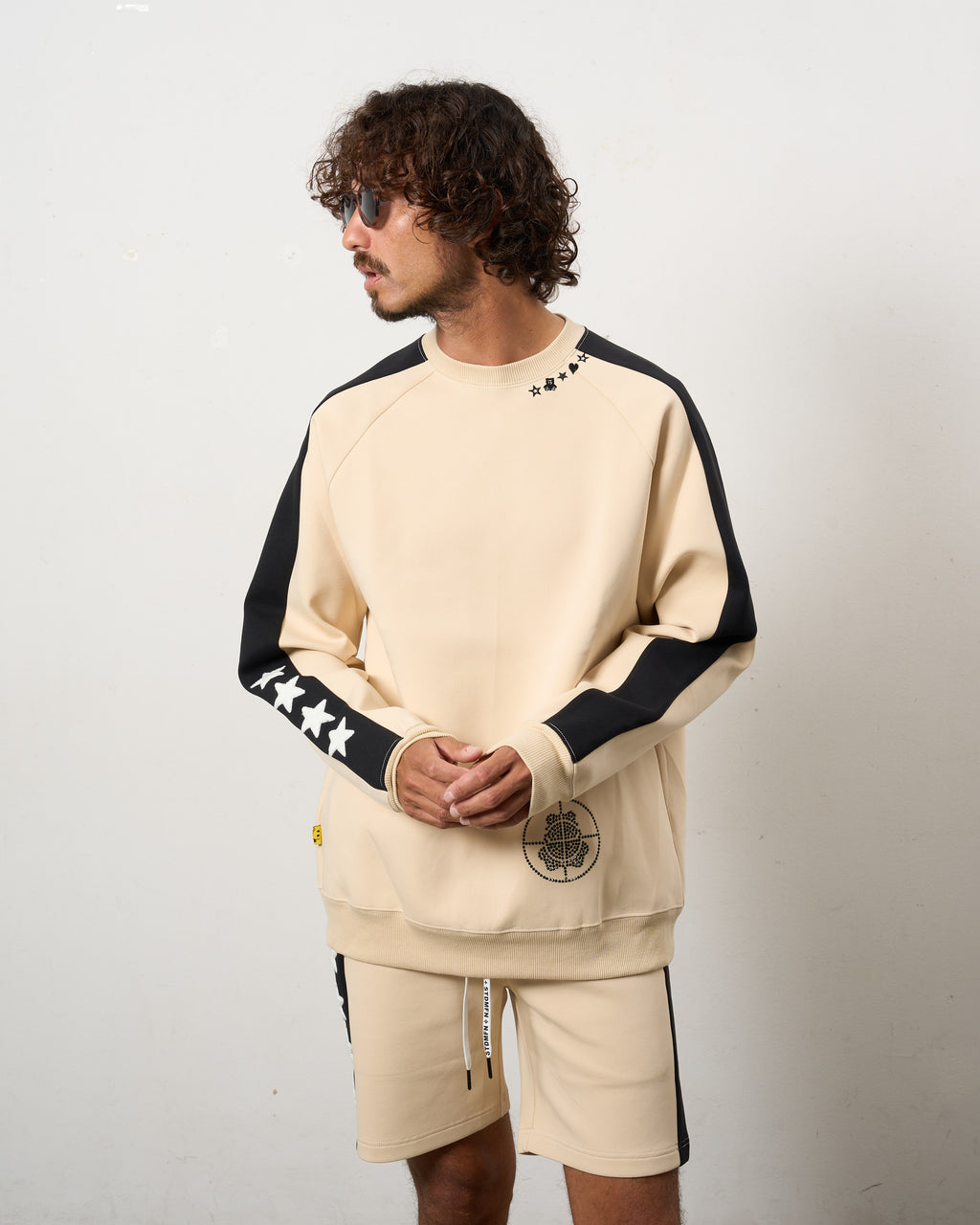 TRストレッチポンチ ラインストーン ターゲットベア ラインスエットシャツ