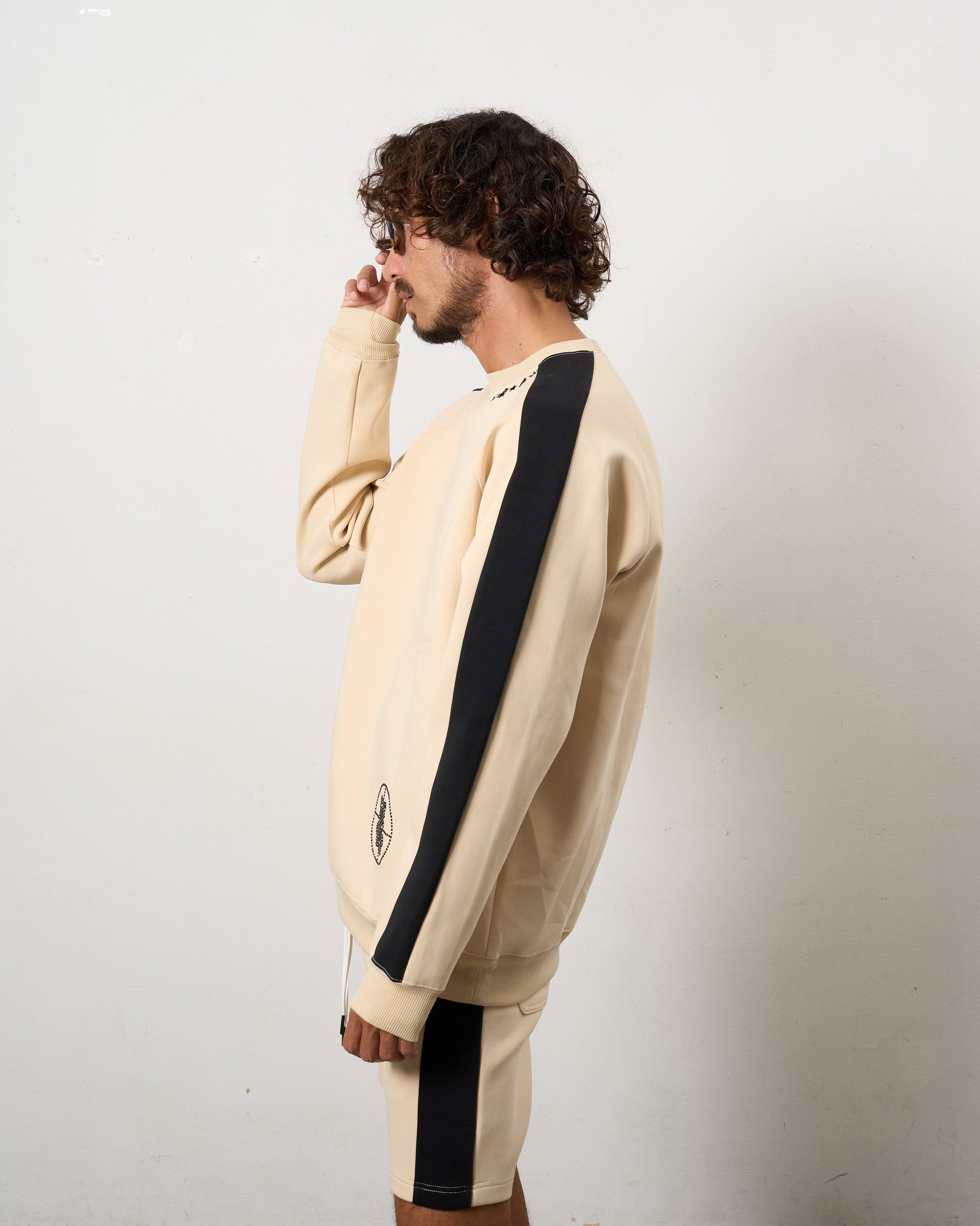 TRストレッチポンチ ラインストーン ターゲットベア ラインスエットシャツ