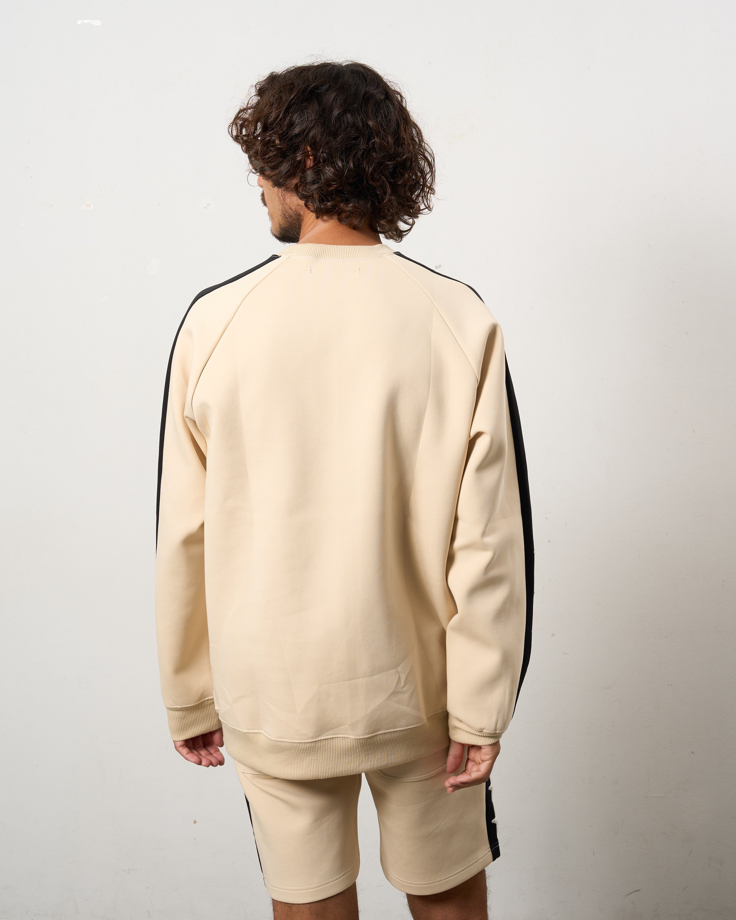 TRストレッチポンチ ラインストーン ターゲットベア ラインスエットシャツ