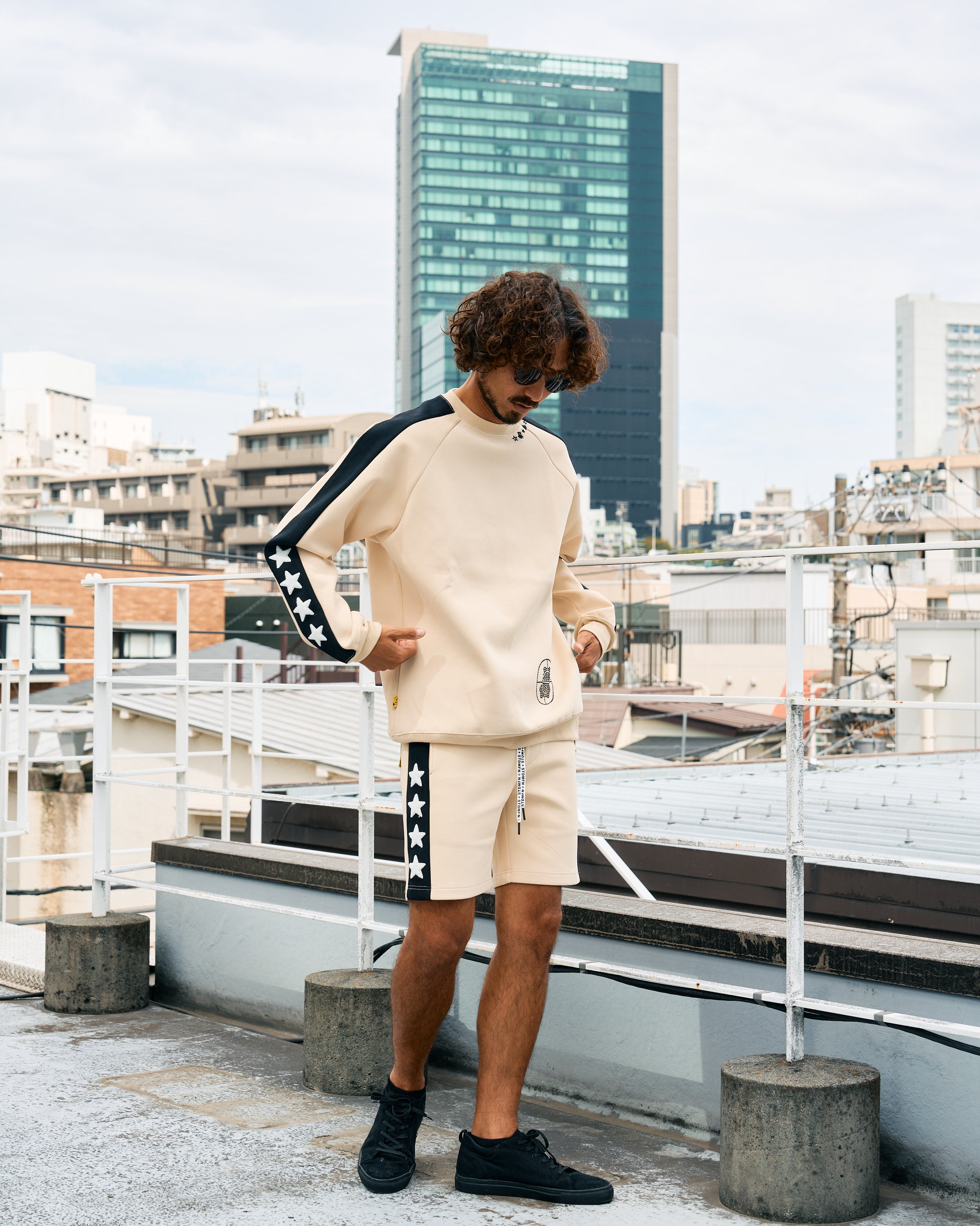 TRストレッチポンチ ラインストーン ターゲットベア ラインスエットシャツ