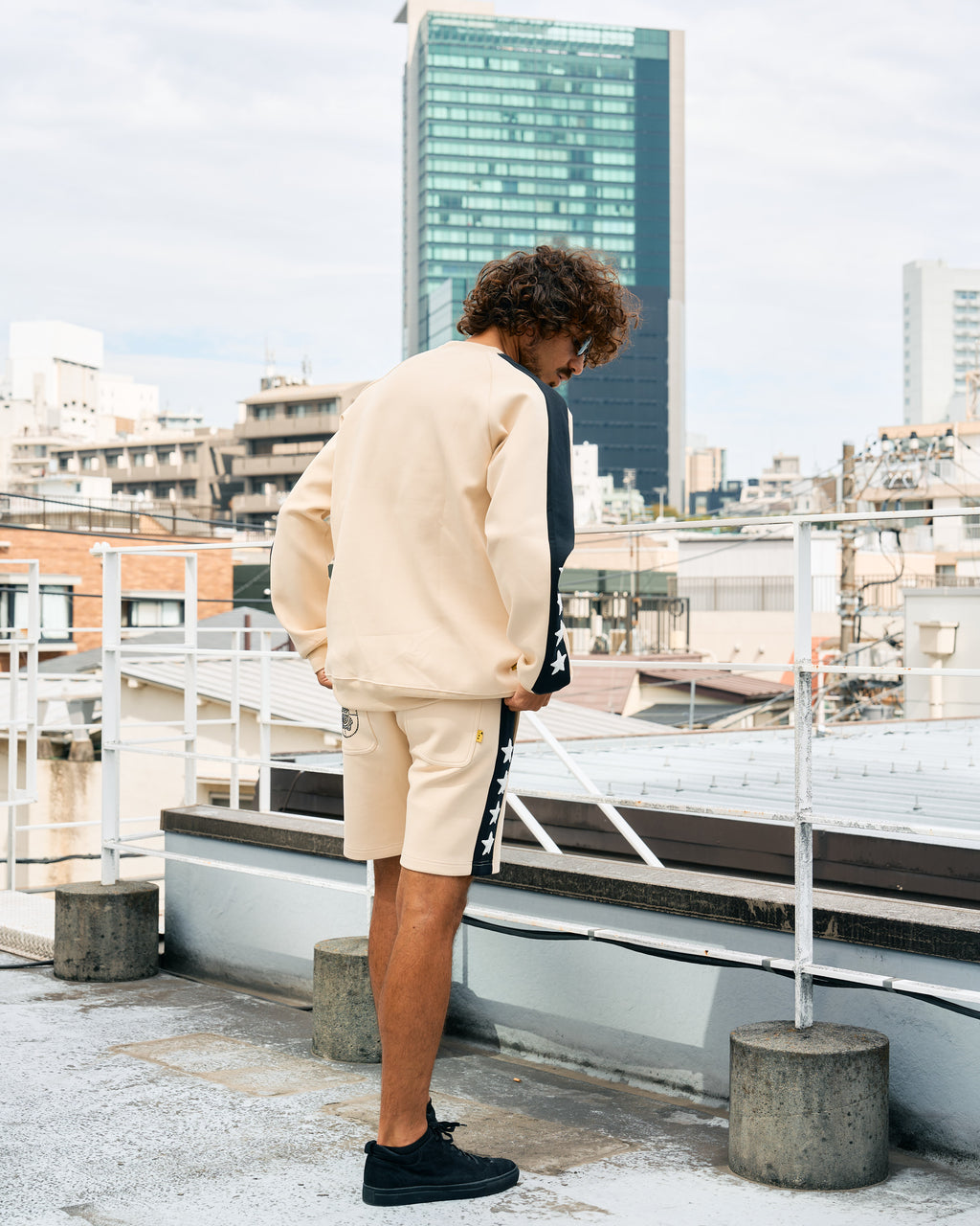 TRストレッチポンチ ラインストーン ターゲットベア ラインスエットシャツ