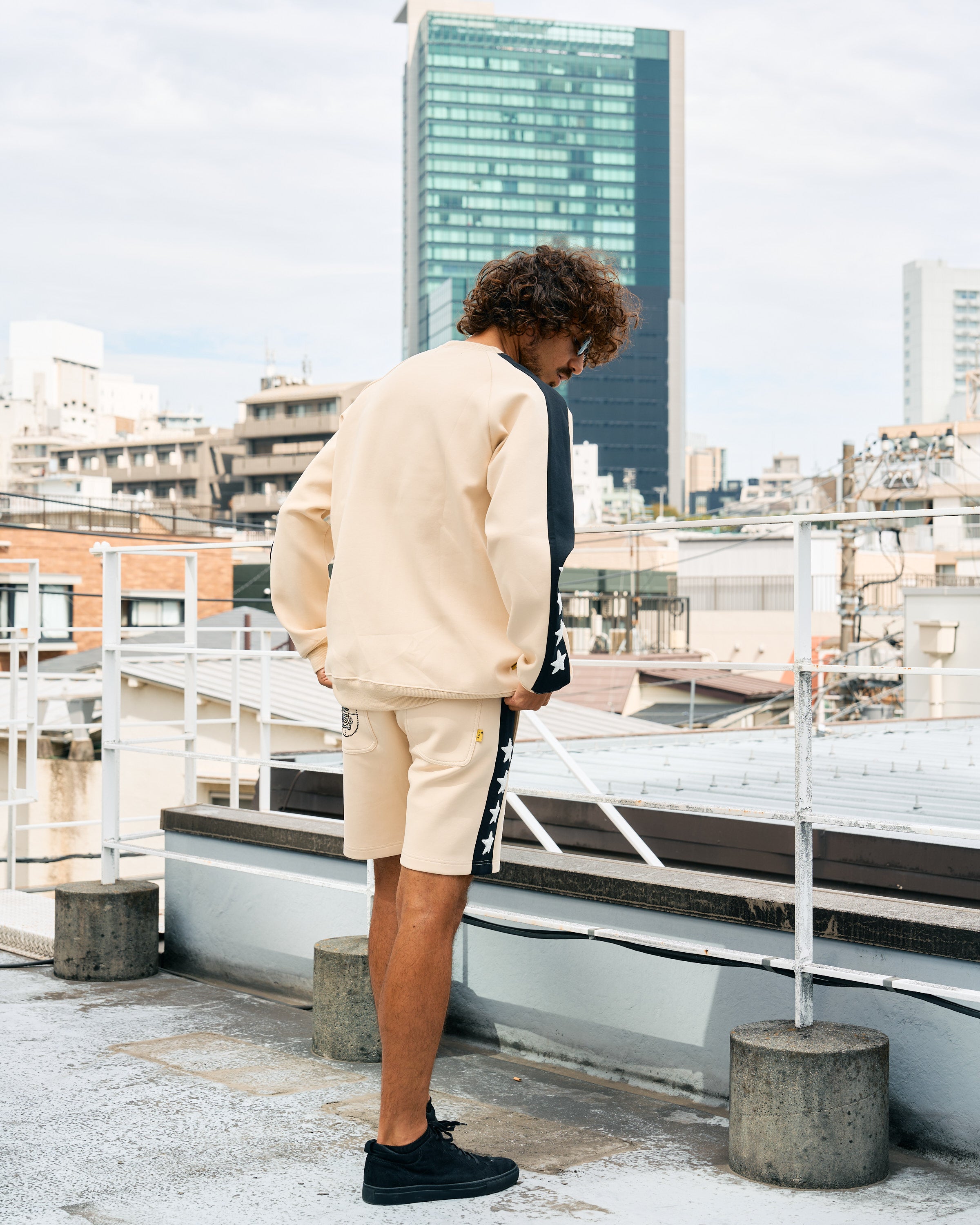 TRストレッチポンチ ラインストーン ターゲットベア ラインスエットシャツ