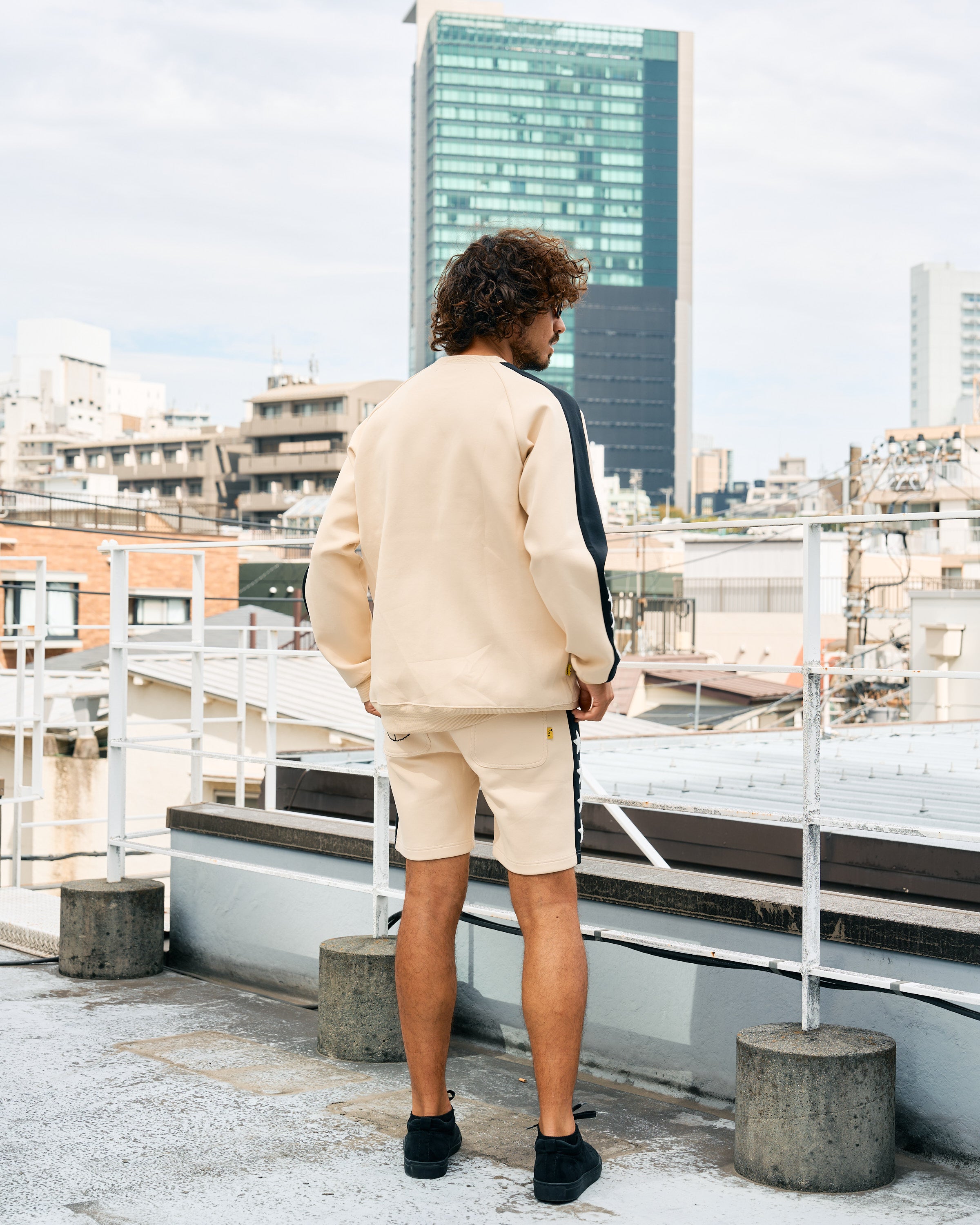 TRストレッチポンチ ラインストーン ターゲットベア ラインスエットシャツ