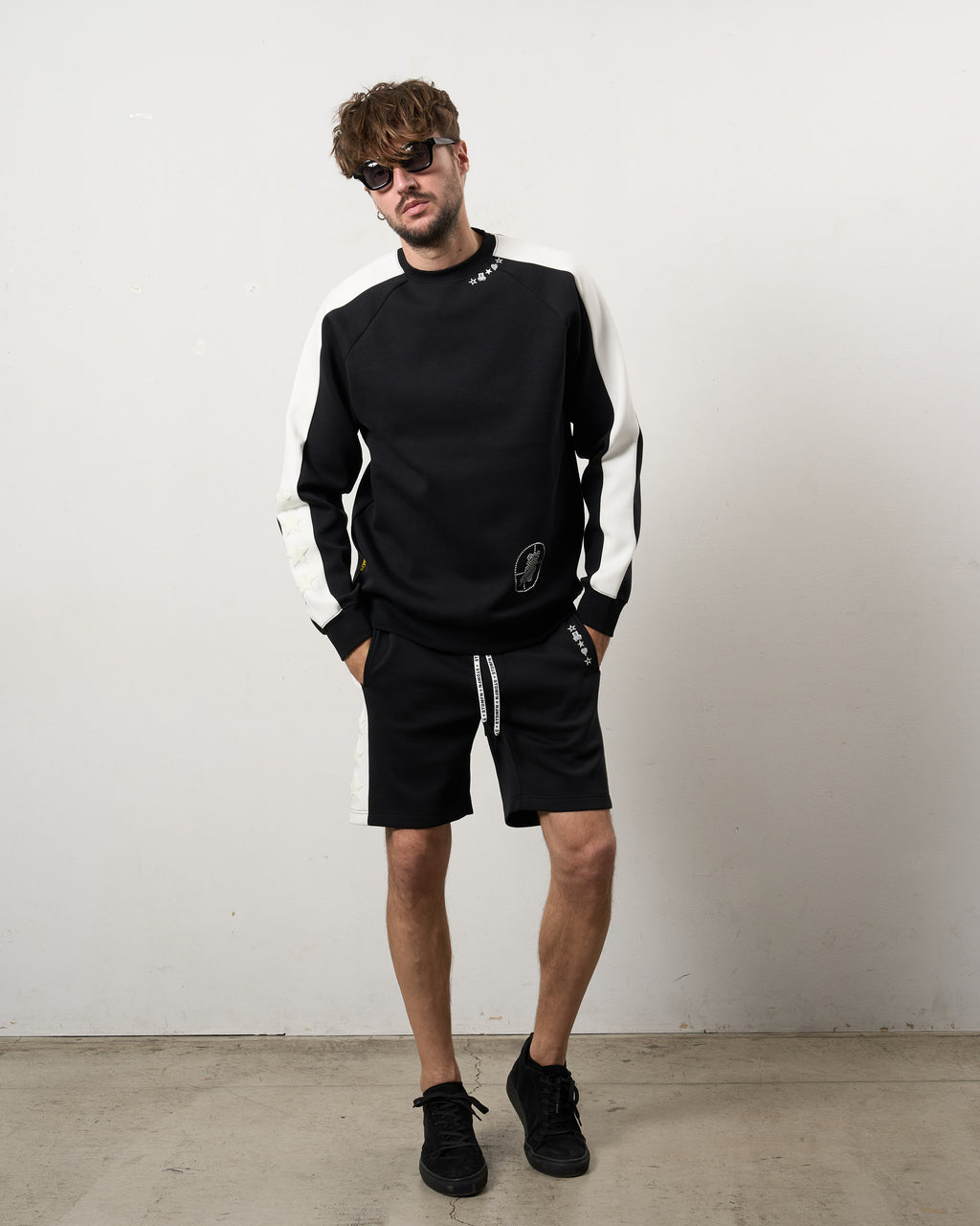 TRストレッチポンチ ラインストーン ターゲットベア ラインスエットシャツ