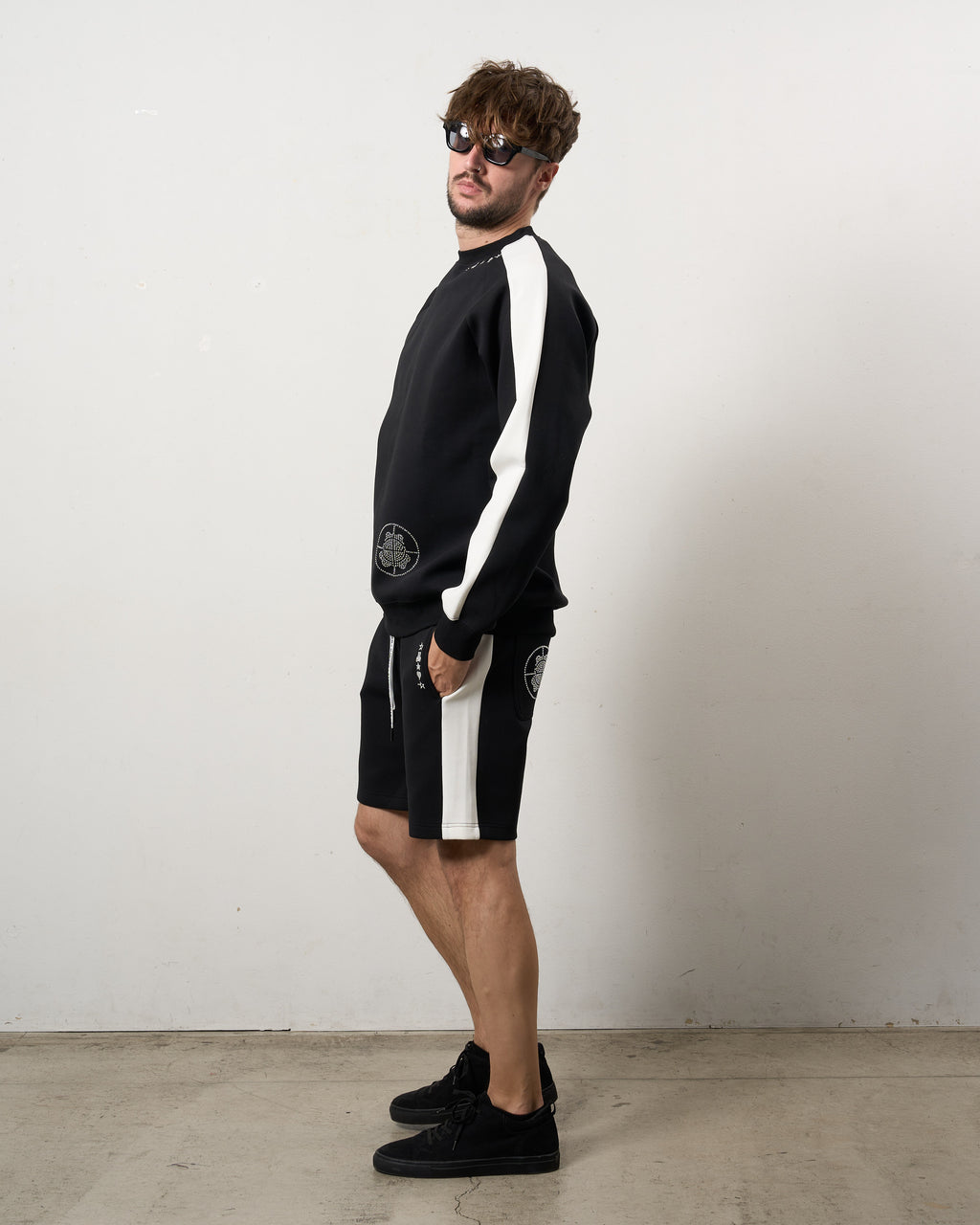 TRストレッチポンチ ラインストーン ターゲットベア ラインスエットシャツ