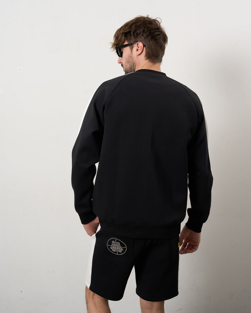 TRストレッチポンチ ラインストーン ターゲットベア ラインスエットシャツ