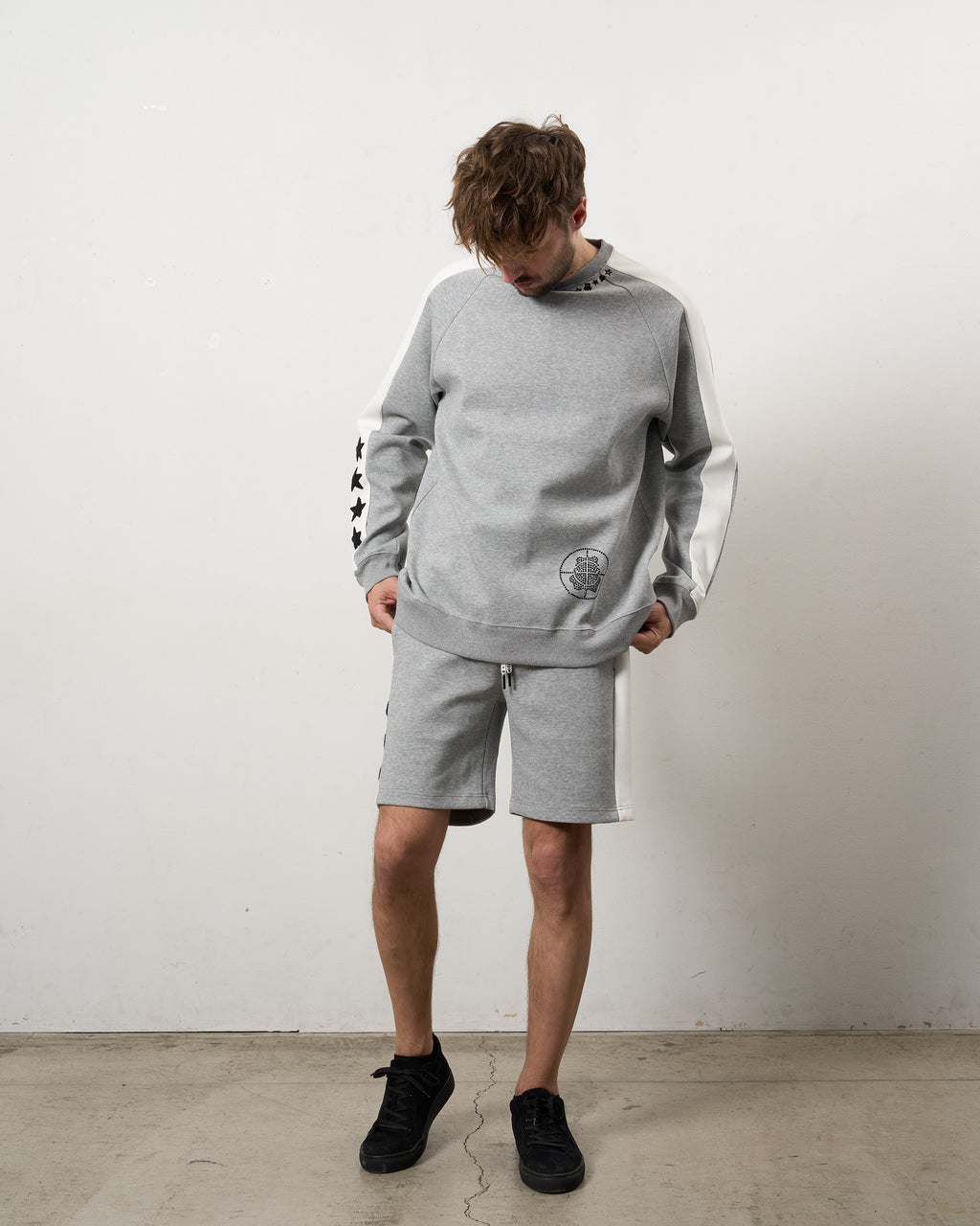 TRストレッチポンチ ラインストーン ターゲットベア ラインスエットシャツ