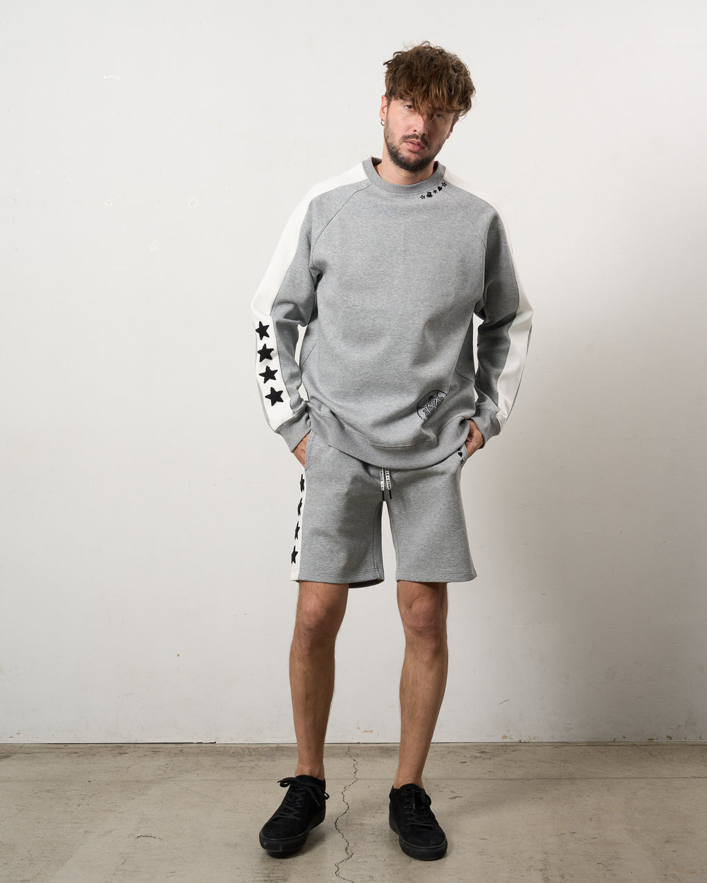 TRストレッチポンチ ラインストーン ターゲットベア ラインスエットシャツ