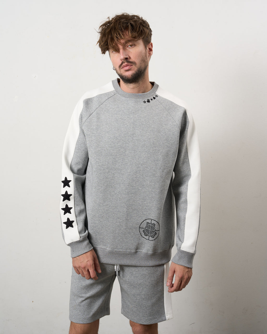 TRストレッチポンチ ラインストーン ターゲットベア ラインスエットシャツ