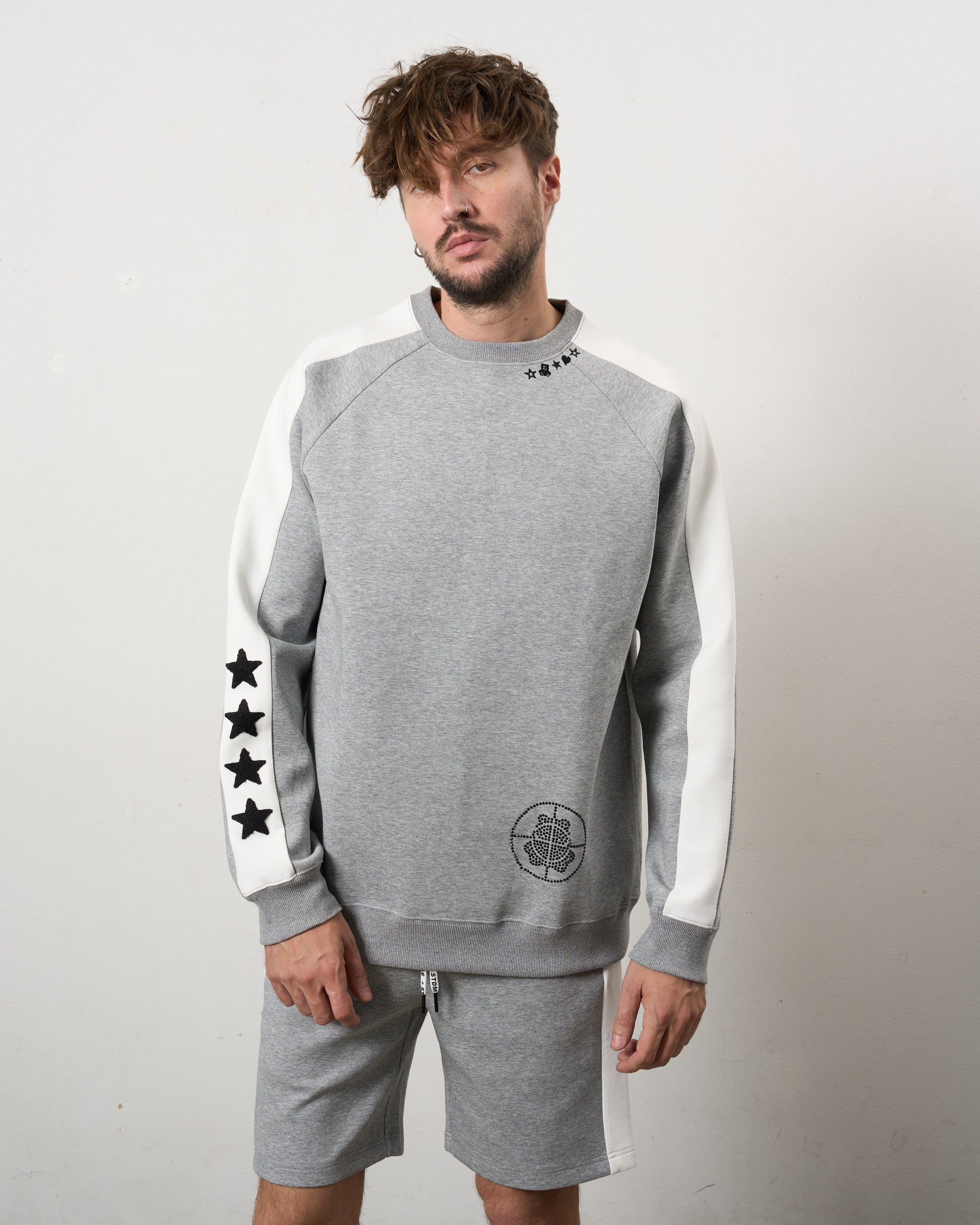 TRストレッチポンチ ラインストーン ターゲットベア ラインスエットシャツ