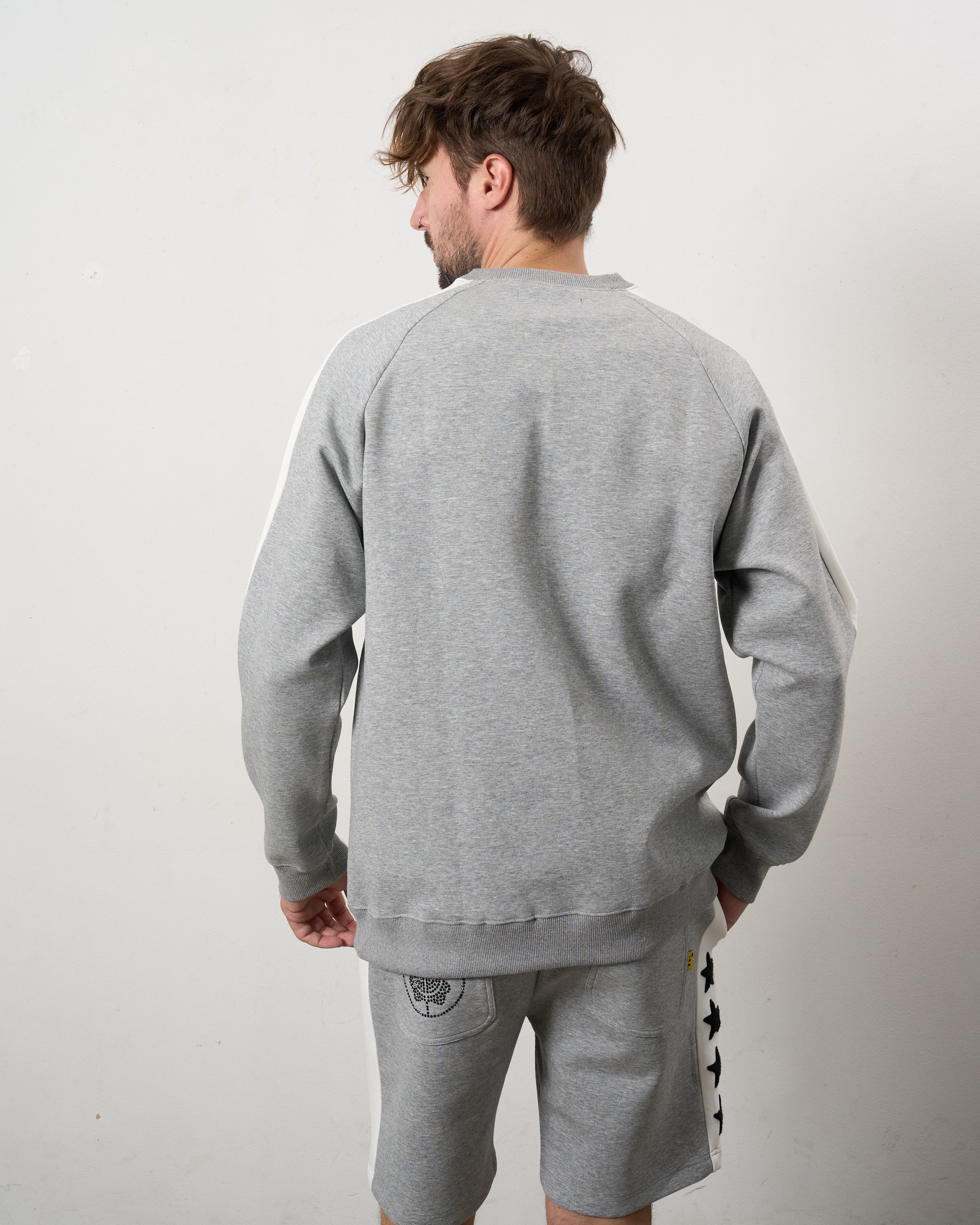 TRストレッチポンチ ラインストーン ターゲットベア ラインスエットシャツ